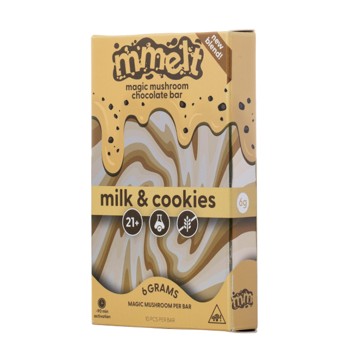 Box of mmelt milk & cookies chocolate bar with mushroom design, Chocolate bars and packaging with 'mmelt' branding on a white background, mmelt magic mushroom chocolate bar, magic mushroom chocolate bar mmelt, mmelt mushroom chocolate bar flavors, mmelt milk and cookies magic mushroom chocolate bar, magic mushroom chocolate bar mmelt milk and cookies